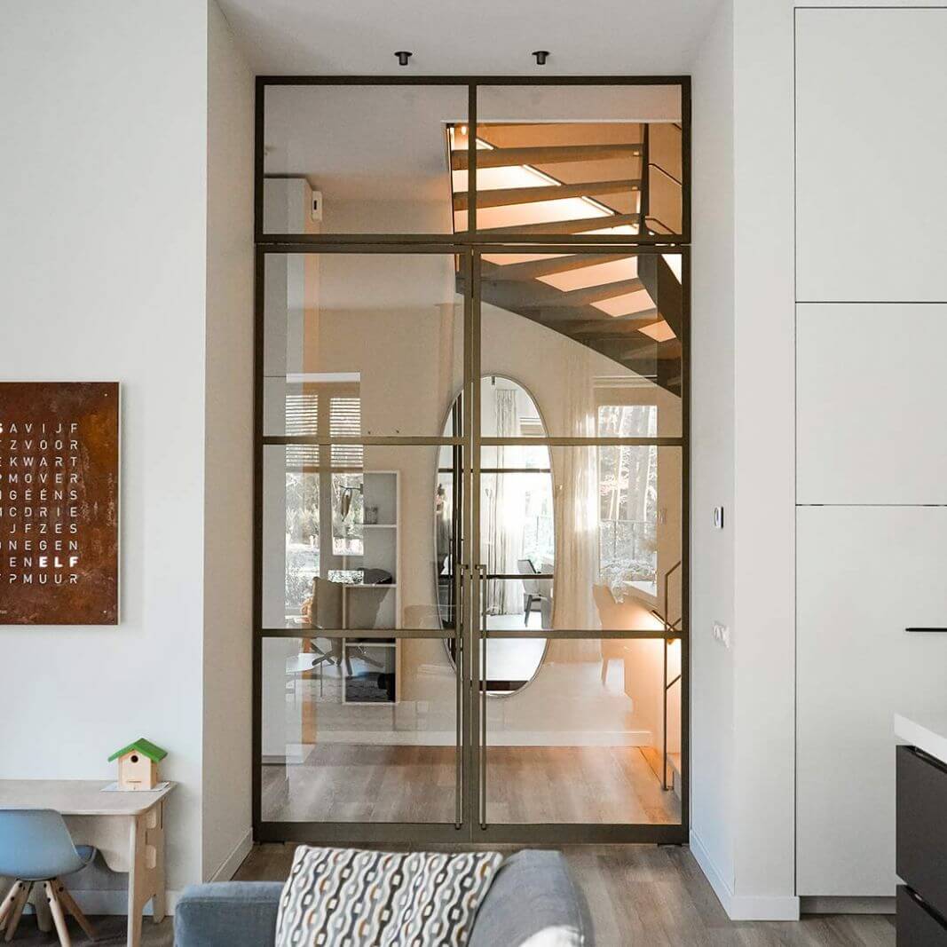 Bronzen stalen deur met bovenlicht