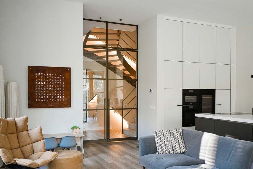 Bronzen taatsdeur met bovenlicht