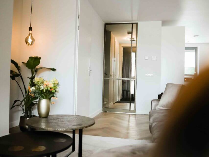 Stalen deur brons woonkamer